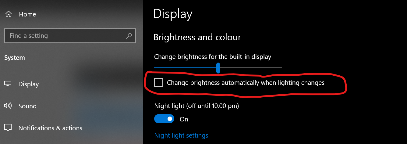Uncheck the change brightness automatically checkbox.